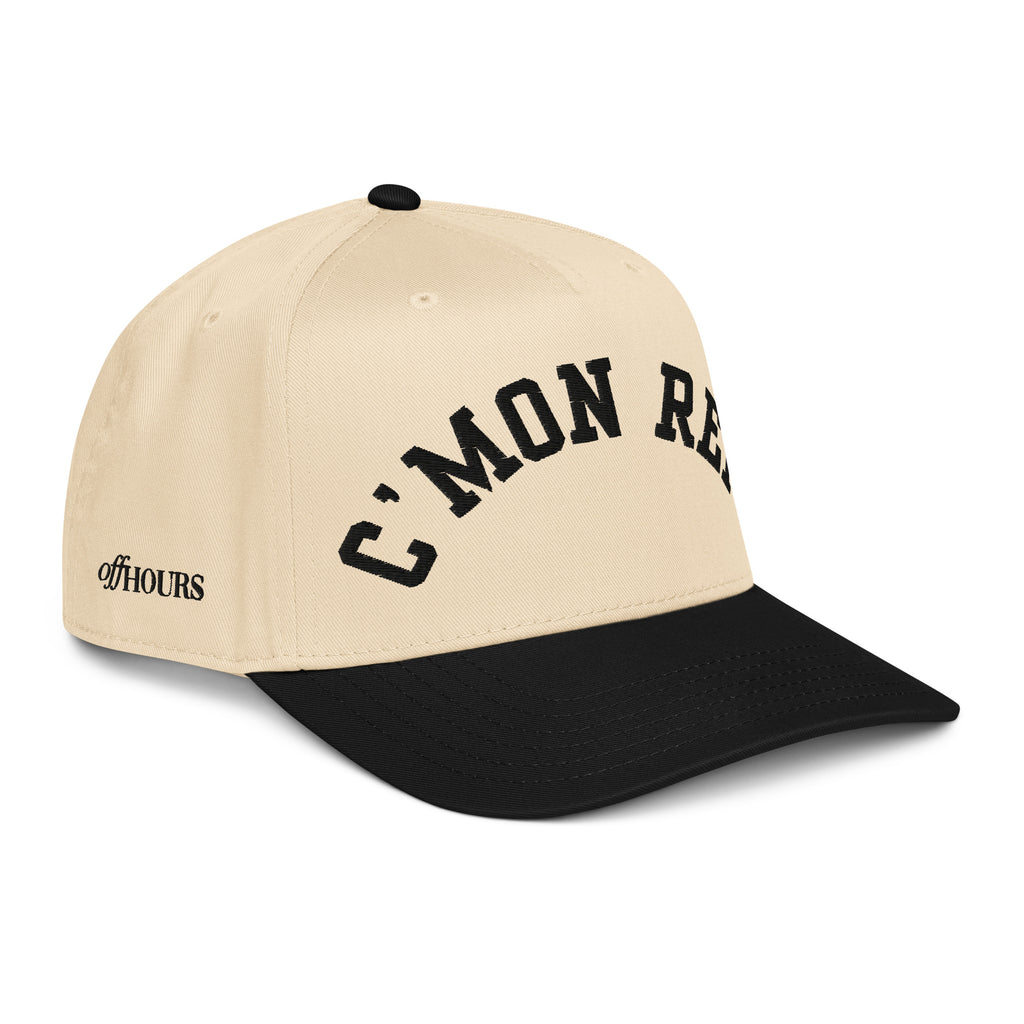 Angled view of C'MON REF! black and natural trucker hat by Off Hours