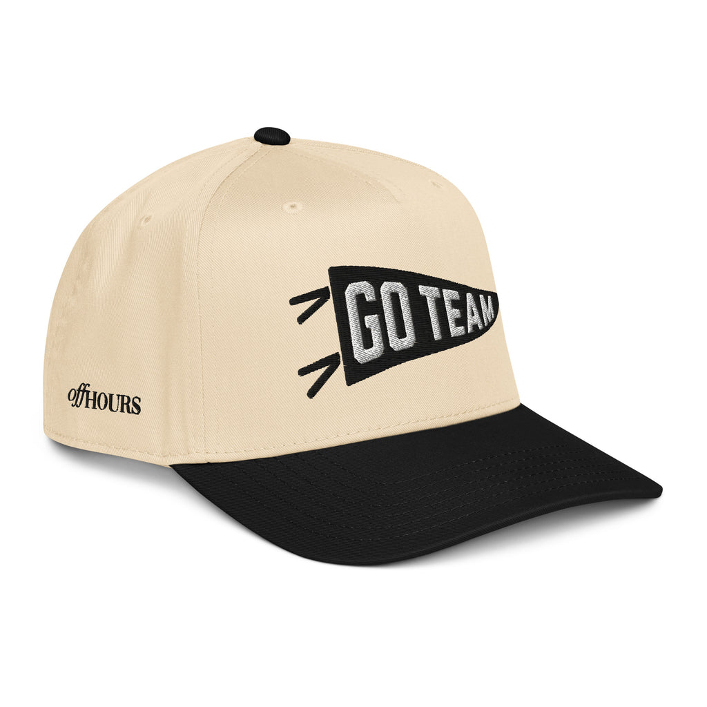Angled view of Go Team black and natural trucker hat by Off Hours