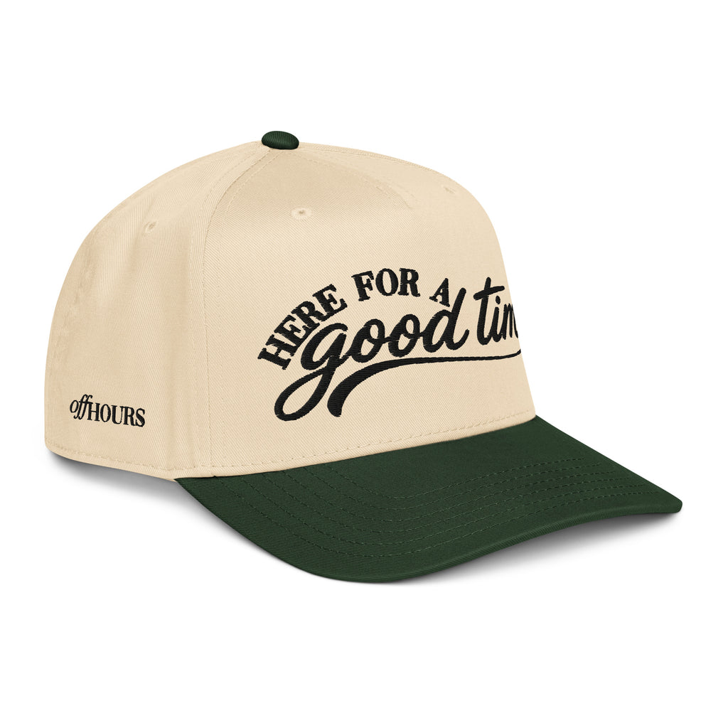 Angled view of Here For A Good Time green and natural trucker hat by Off Hours