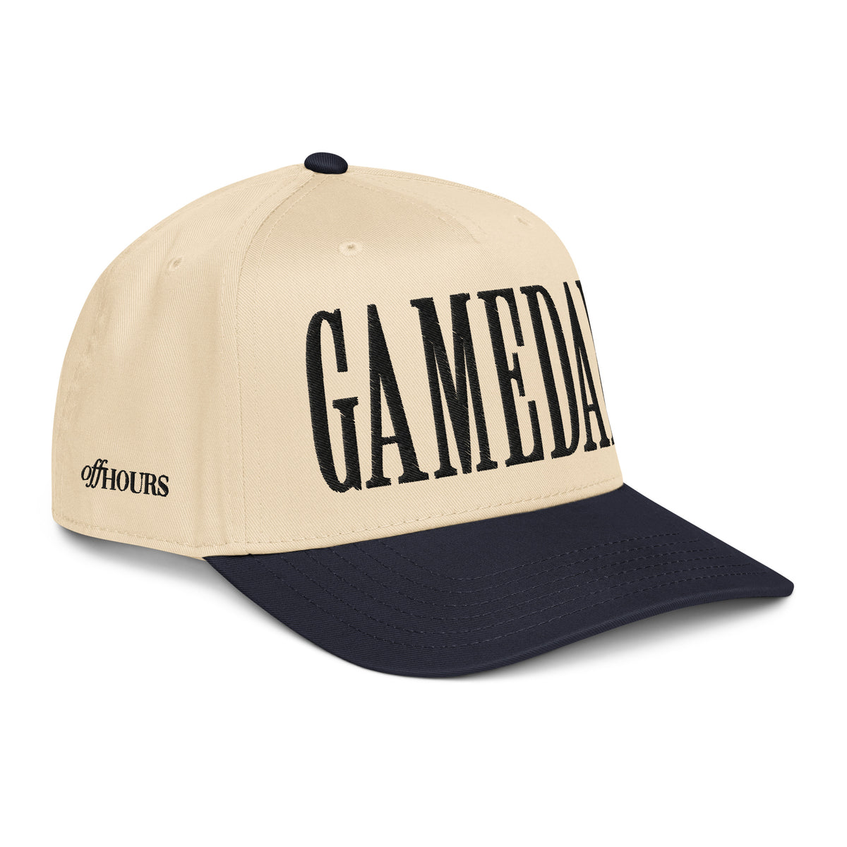 Angled view of Gameday navy and natural trucker hat by Off Hours