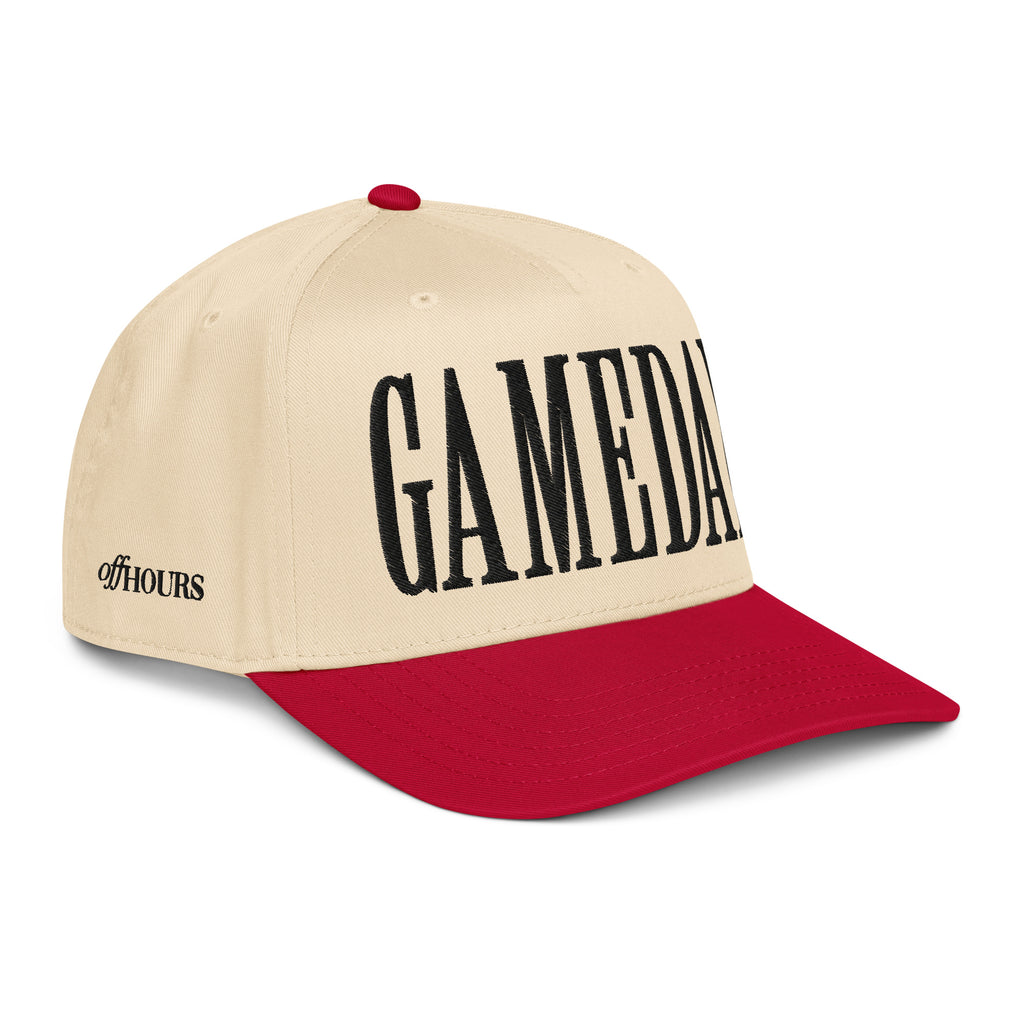 Angled view of Gameday red and natural trucker hat by Off Hours