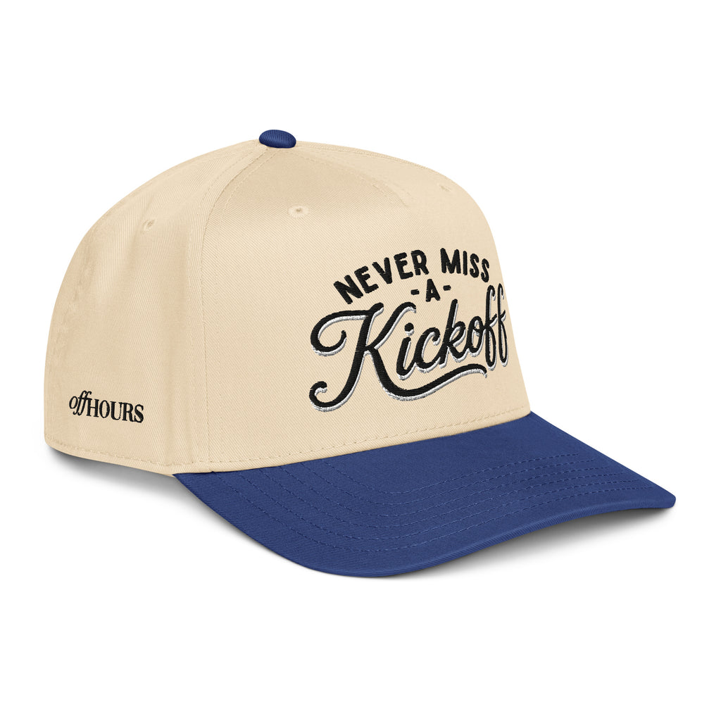 Angled view of Never Miss A Kickoff blue and natural trucker hat by Off Hours