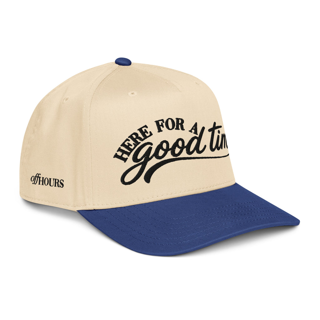 Angled view of Here For A Good Time blue and natural trucker hat by Off Hours