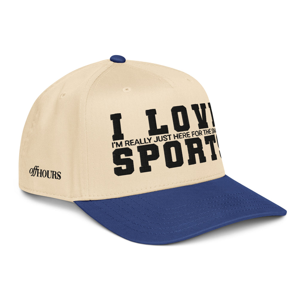 Angled view of I Love Sports blue and natural trucker hat by Off Hours